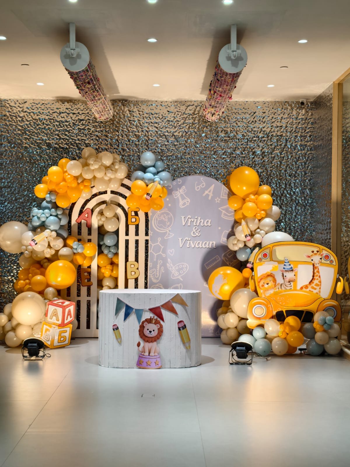Safari School Bus & Pastel Balloon Kids Birthday Setup balloon decoration inspiration
